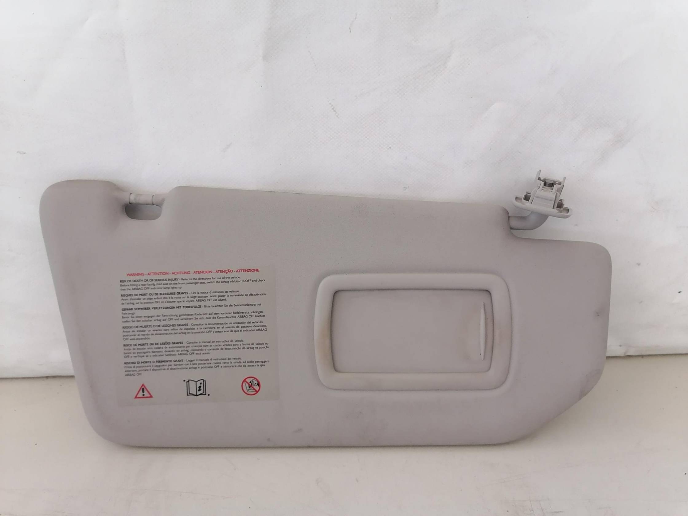 Aletta parasole parabrezza dx.